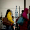 Students walking across Broad Street. Independence Hall seen in background. 