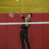 student playing badminton.