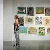 Tyler student looking at artwork.