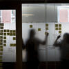 Outline of students studying with sticky notes.