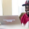 Student working on their laptop.
