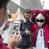 two students posing with Hooter at Temple Japan.