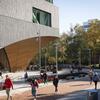 Students walking past Charles Library
